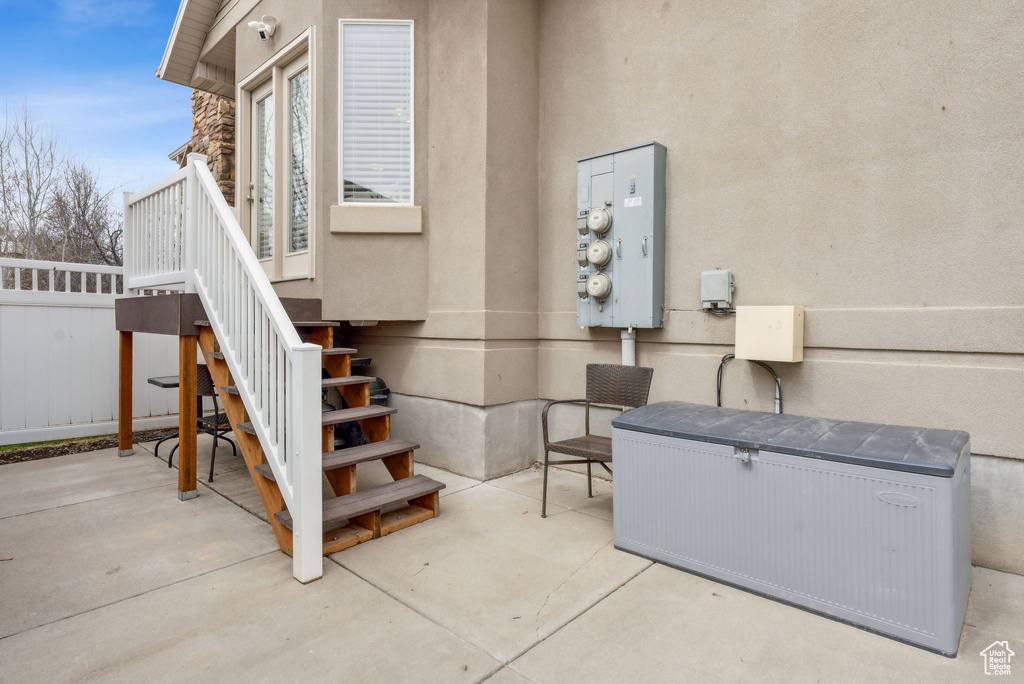 Exterior space featuring fence and stairway