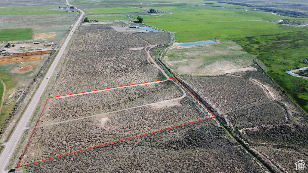 Overview of rural landscape with property parcel outlined