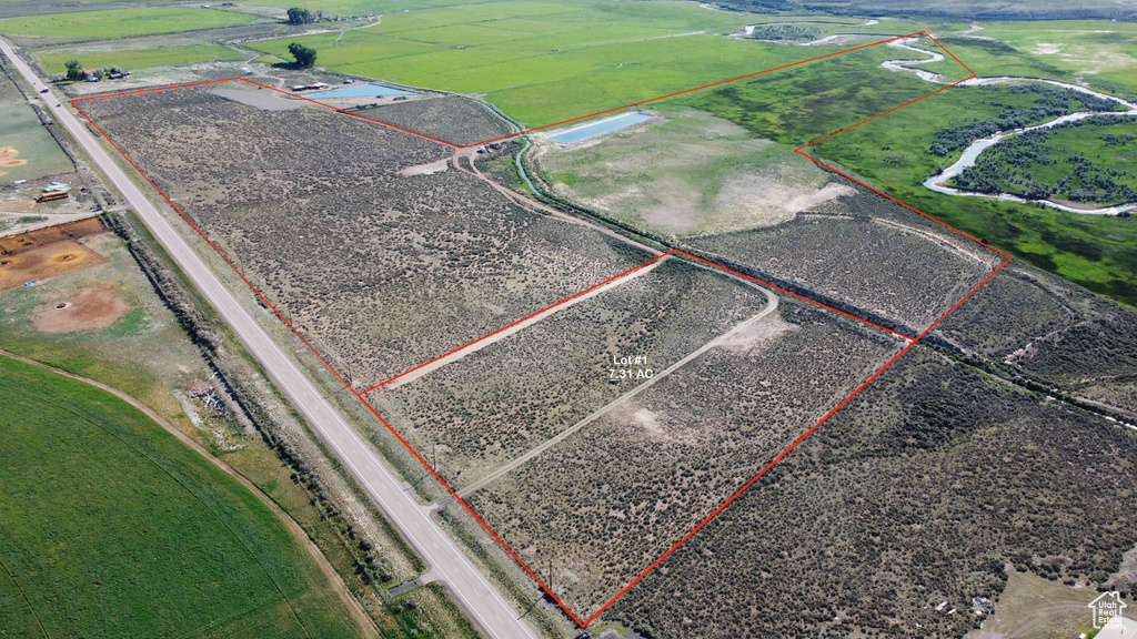 Overview of rural landscape with property parcel outlined