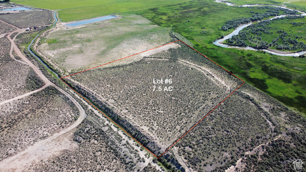 Aerial view of property\'s location featuring property boundaries highlighted