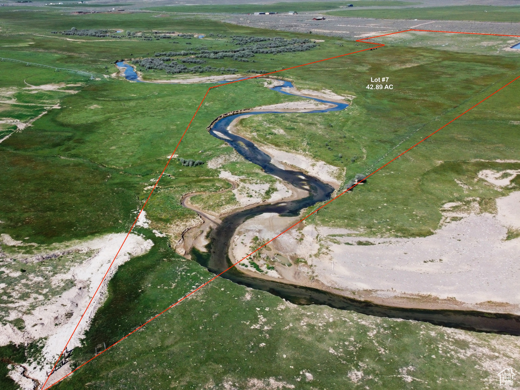 Aerial overview of property\\\\\\\'s location featuring rural landscape and property parcel outlined