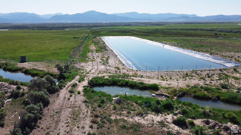 View of rural area with a water and mountain view
