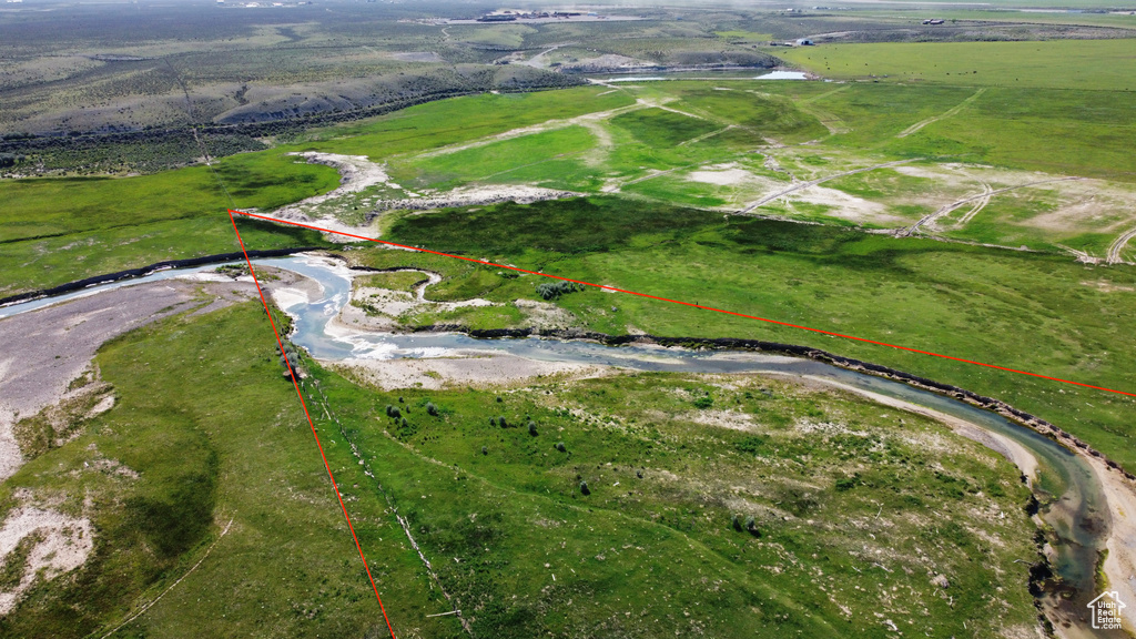 Aerial view of sparsely populated area with property boundaries highlighted