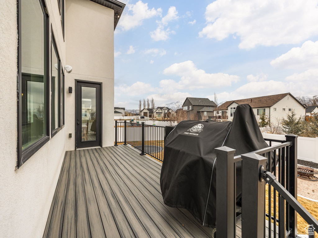 Wooden deck featuring a residential view
