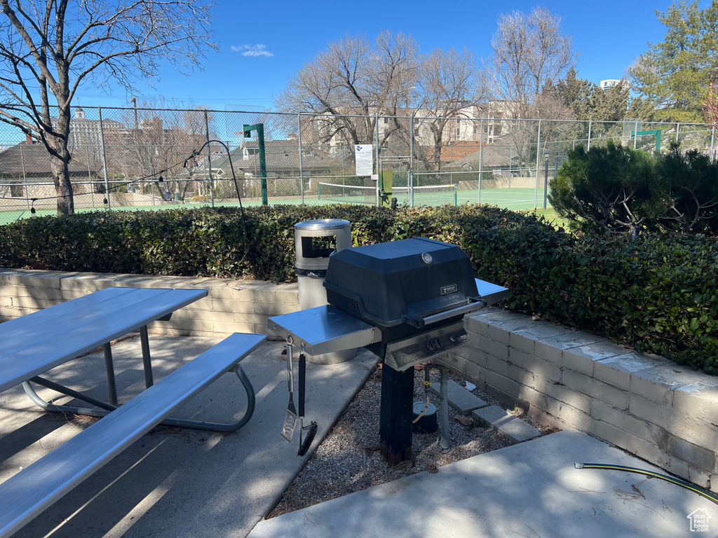 View of patio / terrace featuring fence