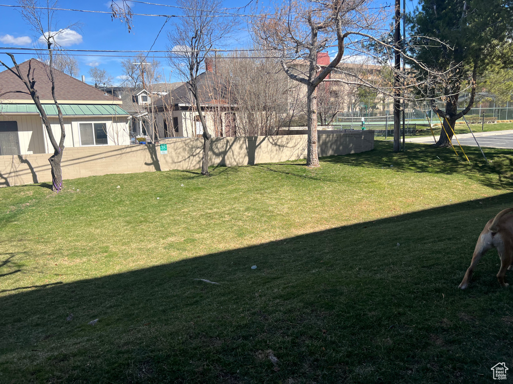 View of yard with fence