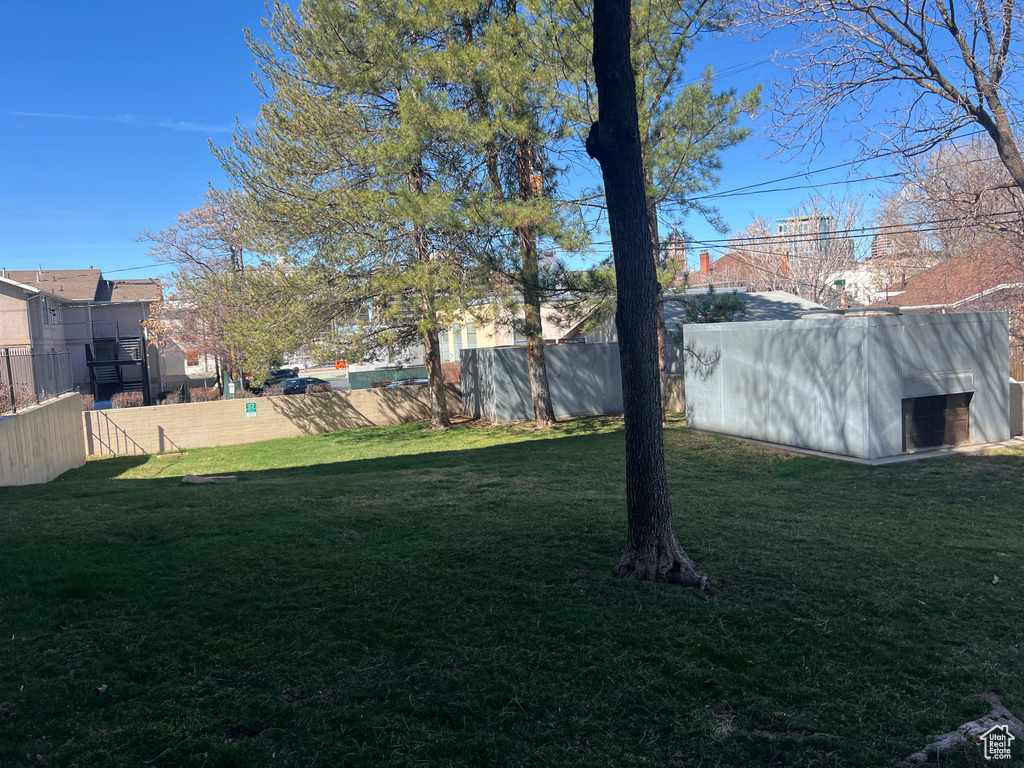 View of yard with fence