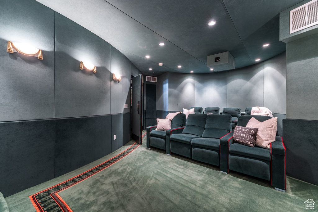 Home theater room featuring carpet flooring, visible vents, and recessed lighting