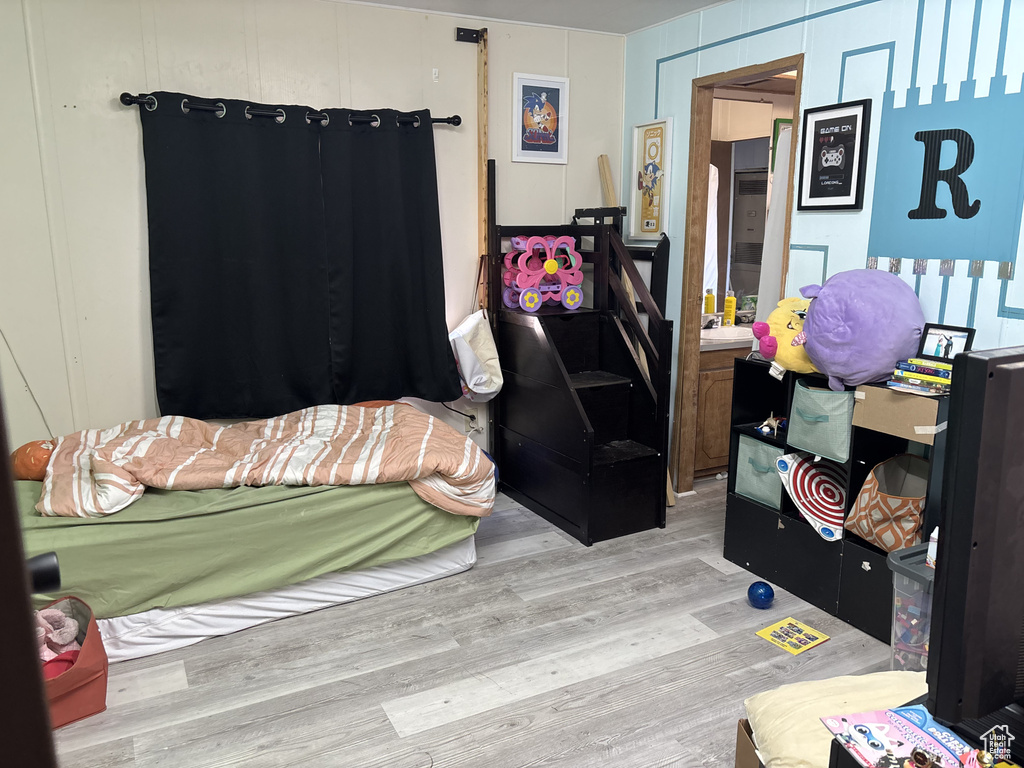 Bedroom featuring wood finished floors