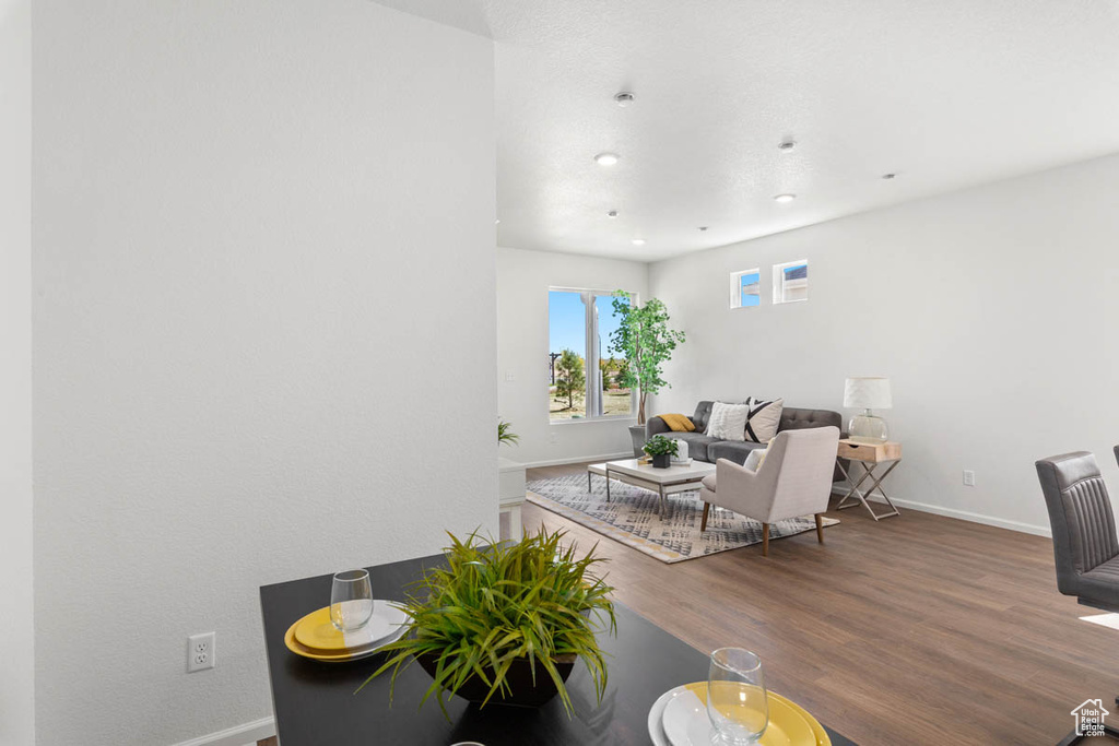 Dining room featuring recessed lighting, baseboards, and wood finished floors