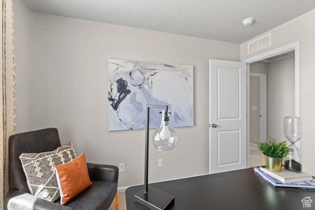 Sitting room featuring visible vents