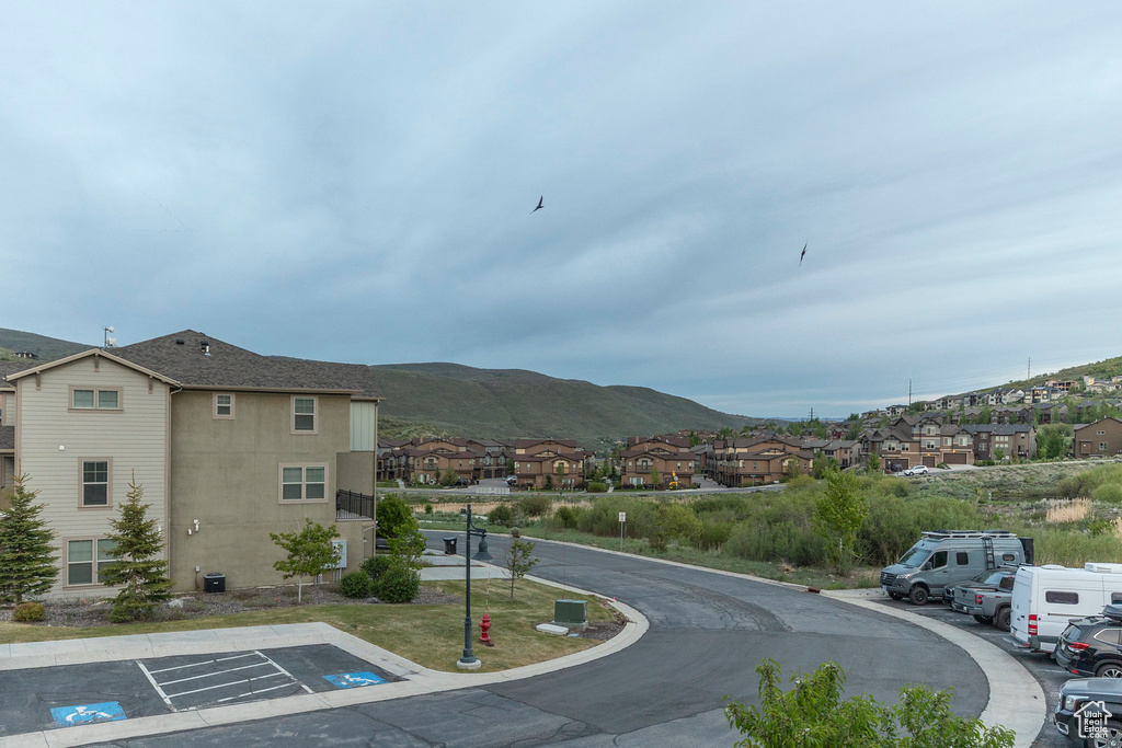 View of mountain backdrop with nearby suburban area