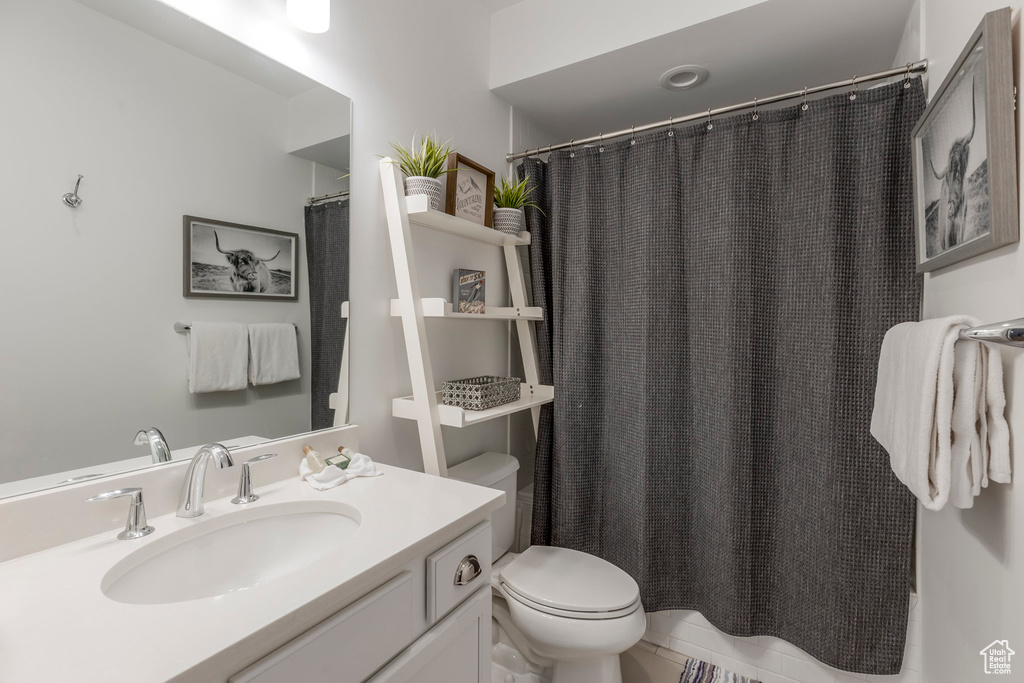 Bathroom with toilet and vanity