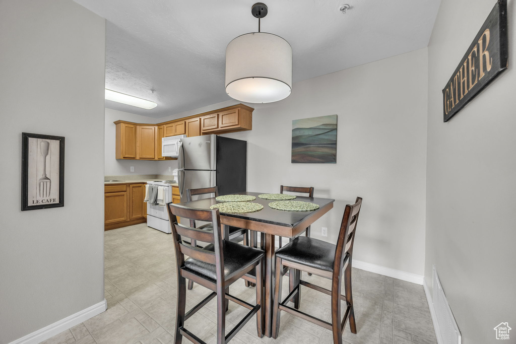 Dining area featuring baseboards