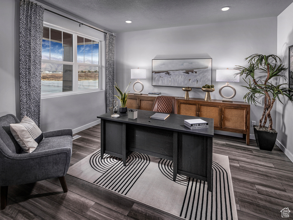 Office area featuring recessed lighting, baseboards, dark wood-style flooring, and a textured ceiling