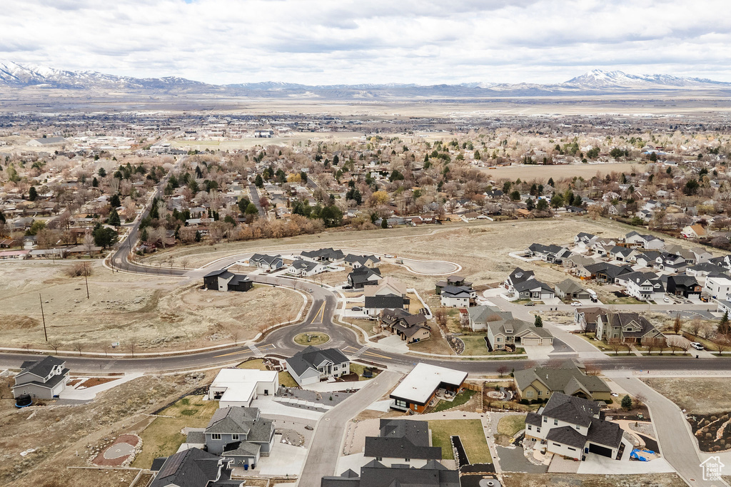 Drone / aerial view with a residential view and a mountain view