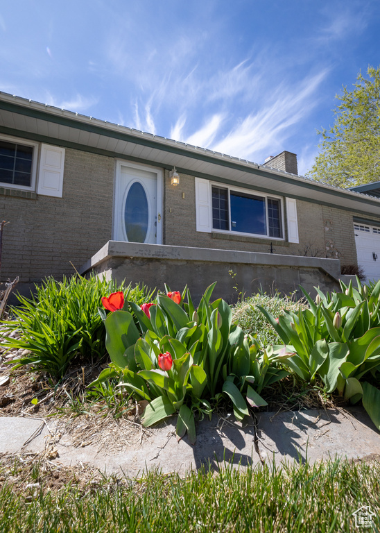 View of front of property with brick siding