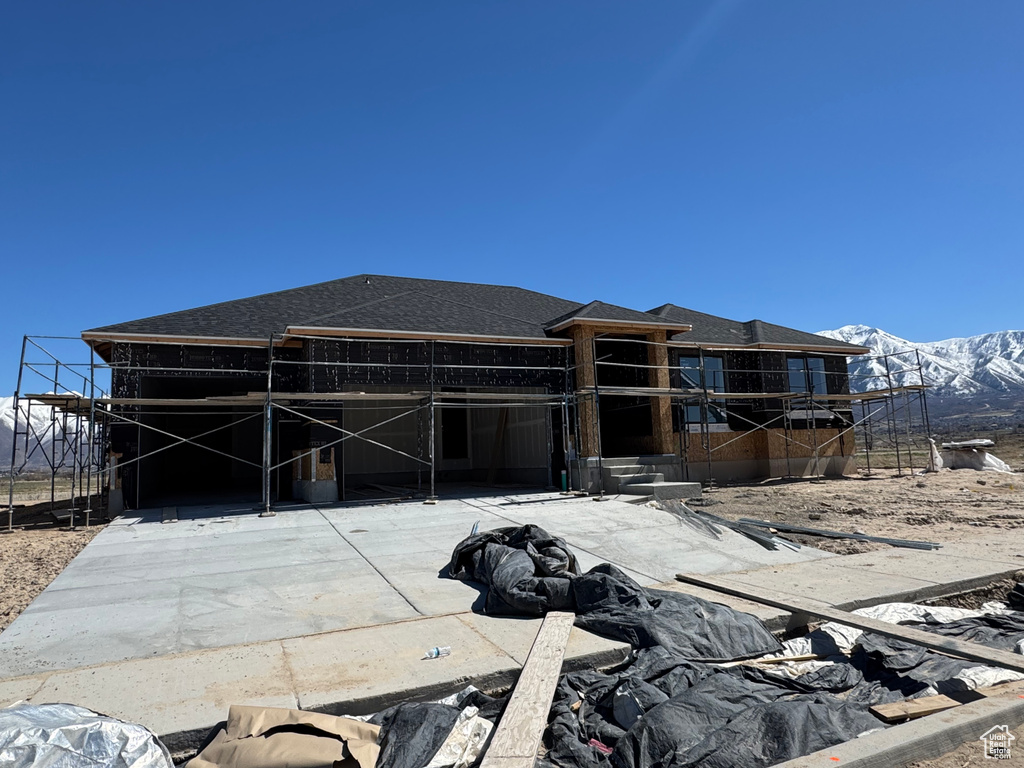 View of front of house featuring a mountain view