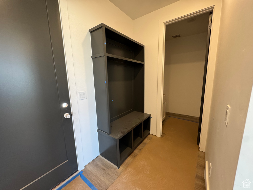 Mudroom featuring visible vents and light wood-style flooring