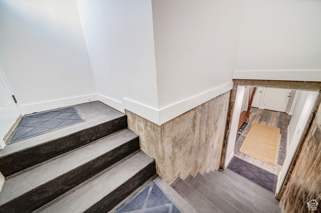 Staircase with wood finished floors