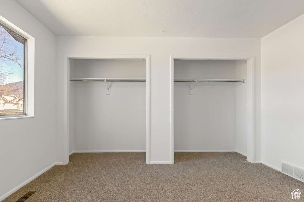Closet featuring visible vents