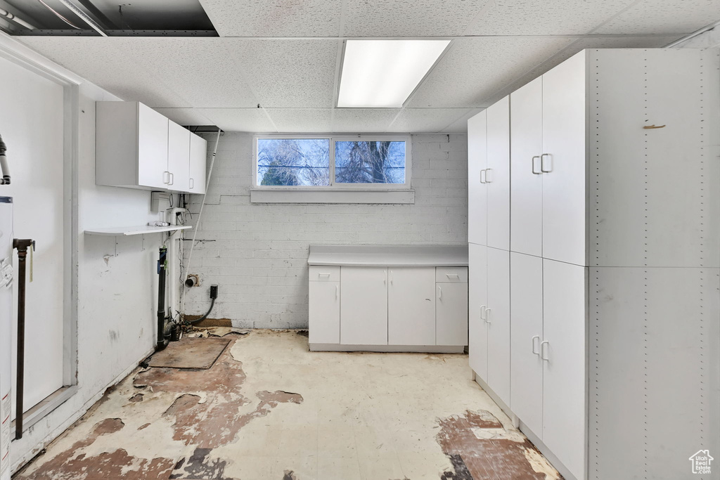 Below grade area with a paneled ceiling