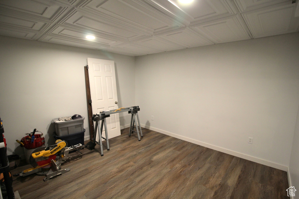 Misc room featuring recessed lighting, dark wood finished floors, and baseboards