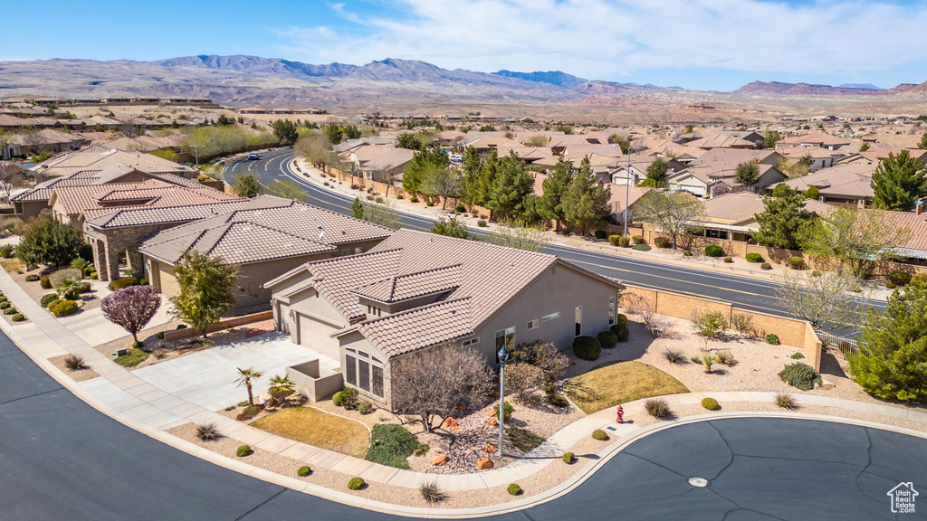 Drone / aerial view with a mountain view and a residential view