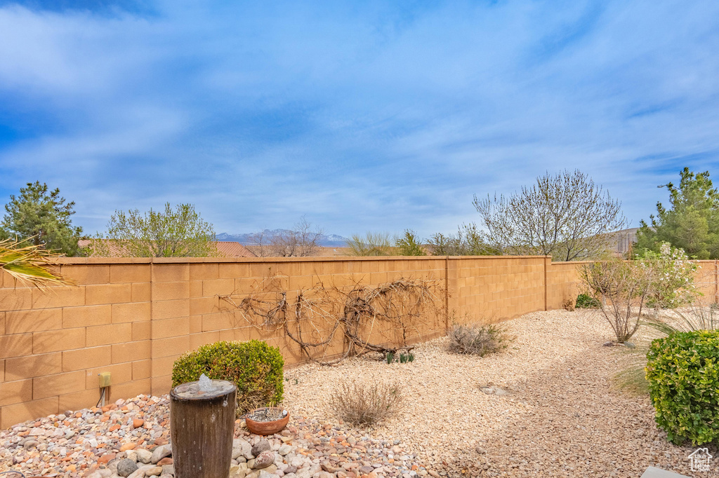 View of yard featuring a fenced backyard