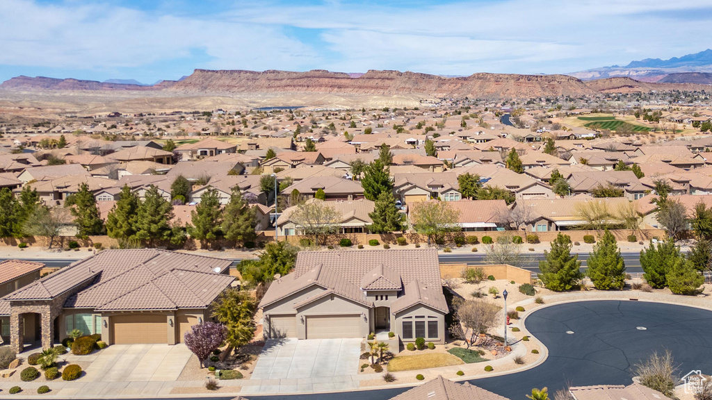 Drone / aerial view featuring a mountain view and a residential view