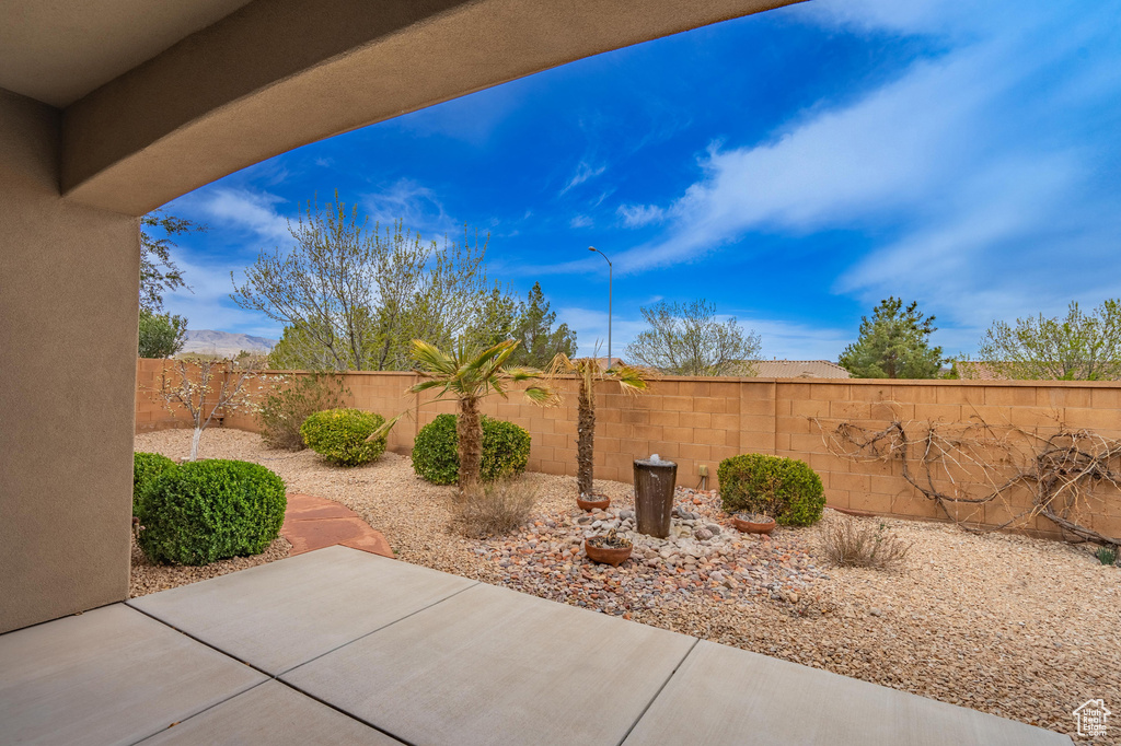 View of patio featuring a fenced backyard