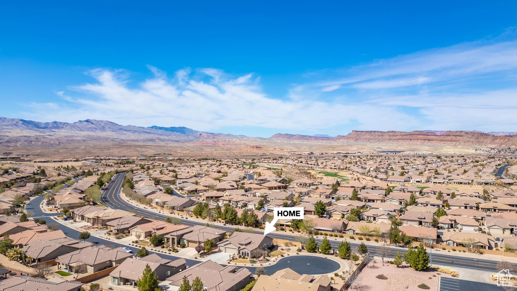 Drone / aerial view featuring a residential view and a mountain view