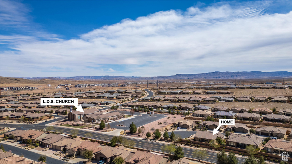 Drone / aerial view featuring a residential view and a mountain view
