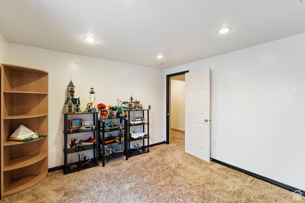 Interior space featuring recessed lighting, carpet, and baseboards