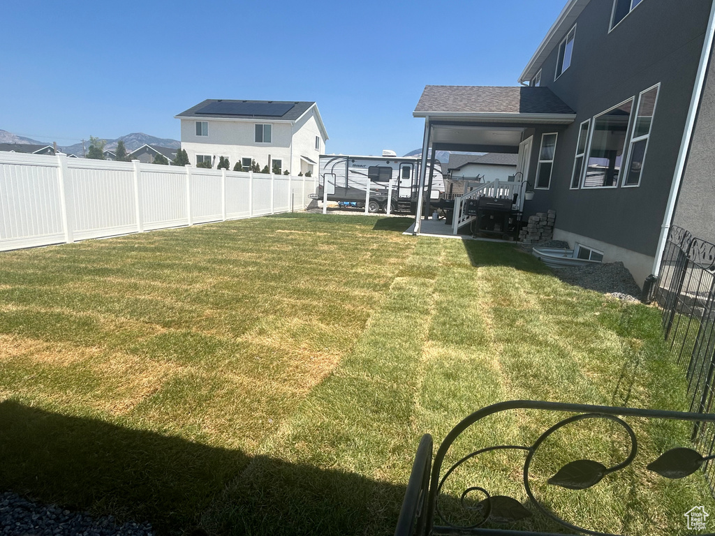 View of fenced backyard