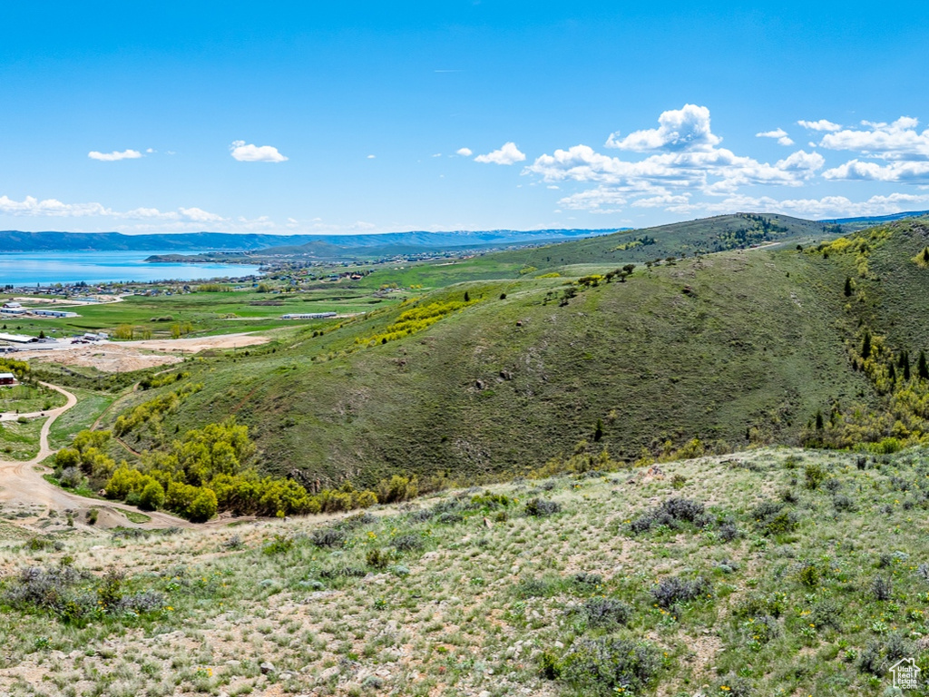 View of mountain background featuring a nearby body of water