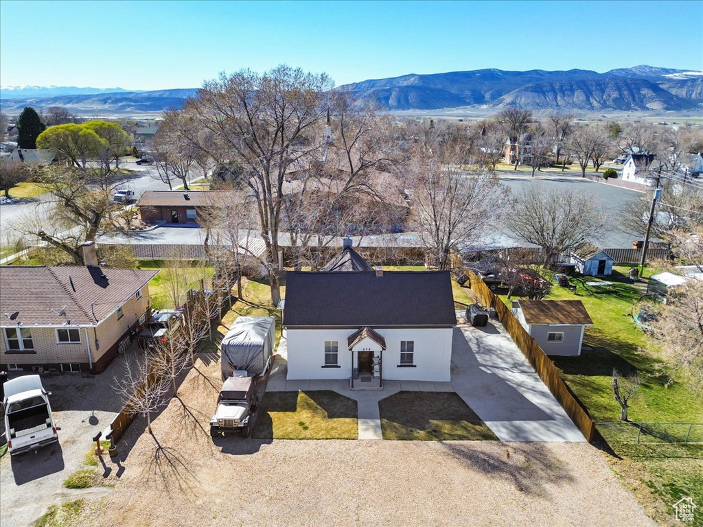 Drone / aerial view featuring a residential view and a mountain view