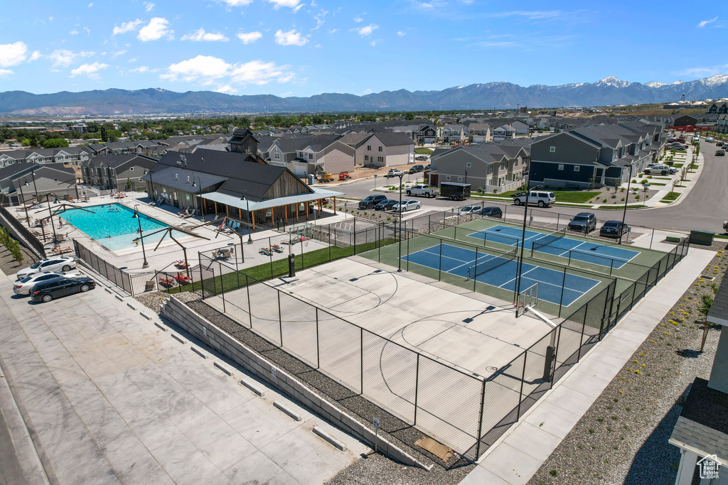 Drone / aerial view with a residential view and a mountain view