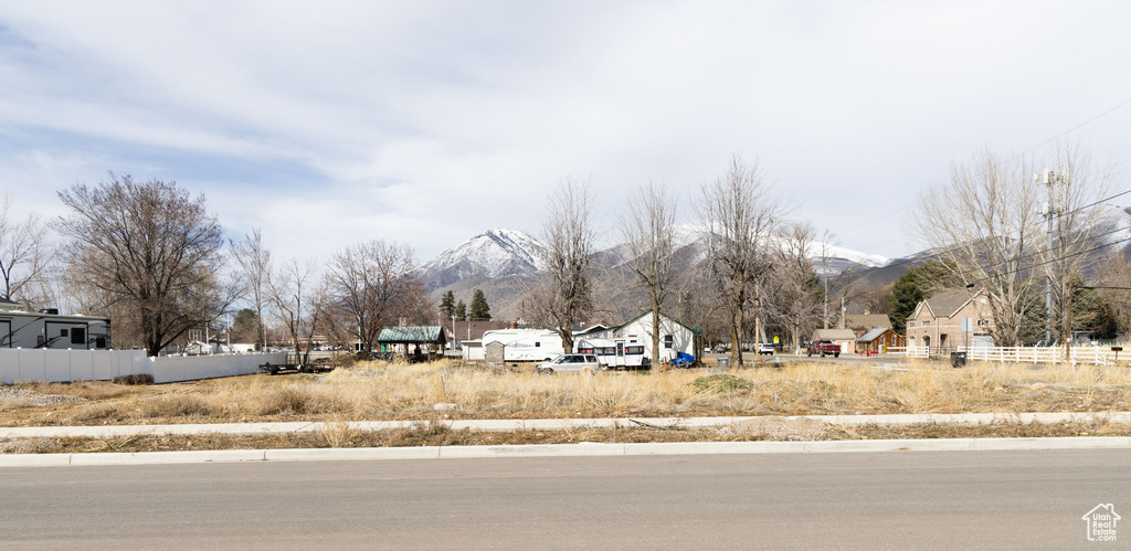 View of asphalt street with a mountain view