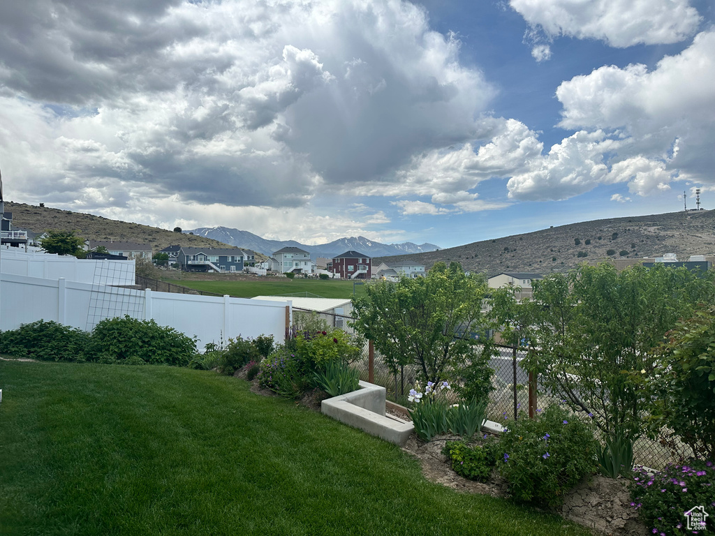View of yard with a mountain view