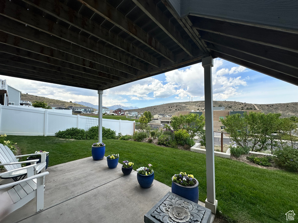 View of patio with a mountain view