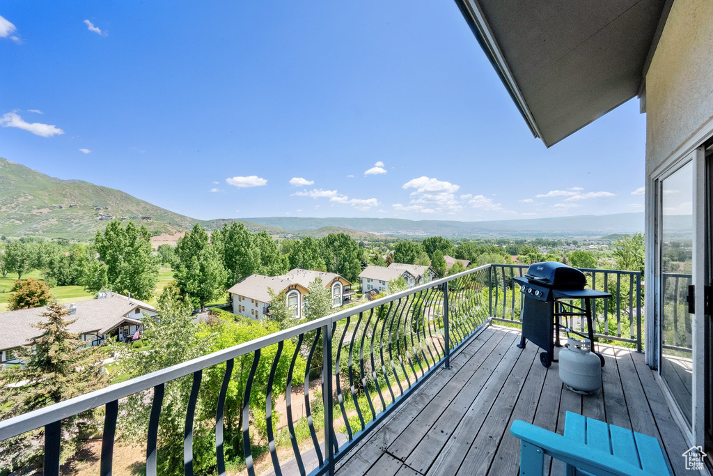 Balcony with grilling area and a mountain view