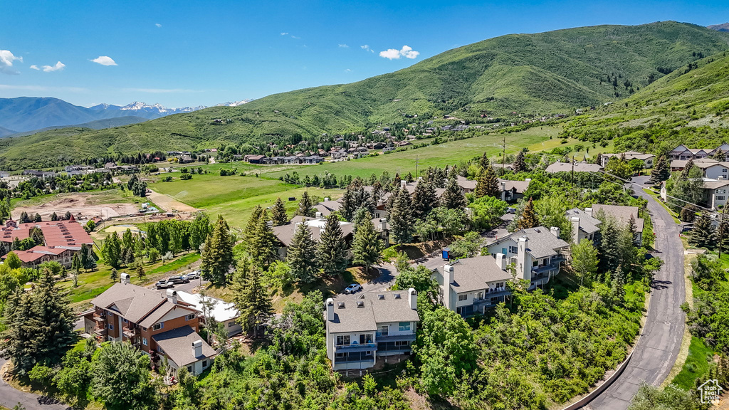 Aerial view of residential area featuring mountains