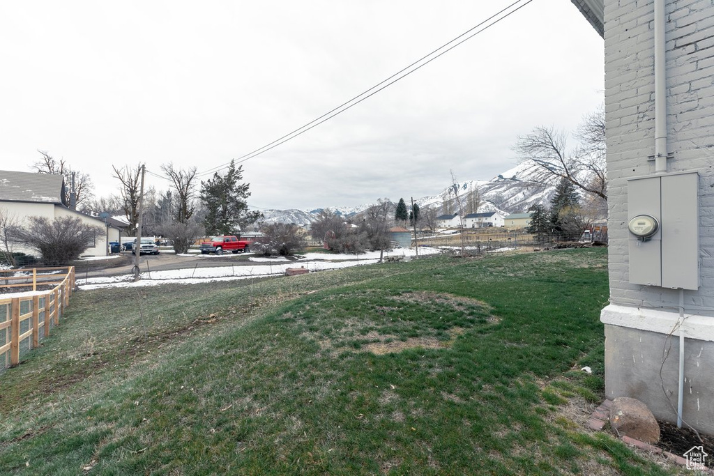 View of yard featuring fence
