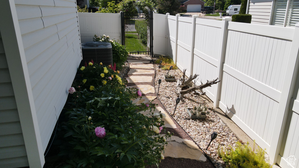 View of yard featuring central AC unit