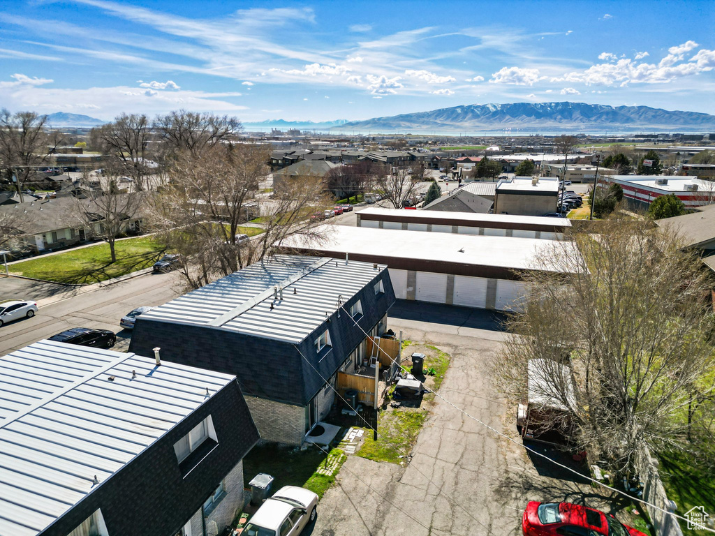 Drone / aerial view featuring a mountain view and a residential view