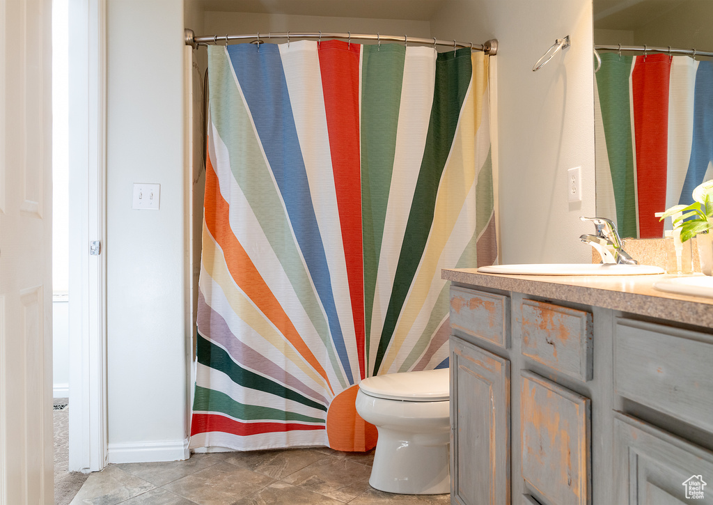 Bathroom featuring toilet and vanity