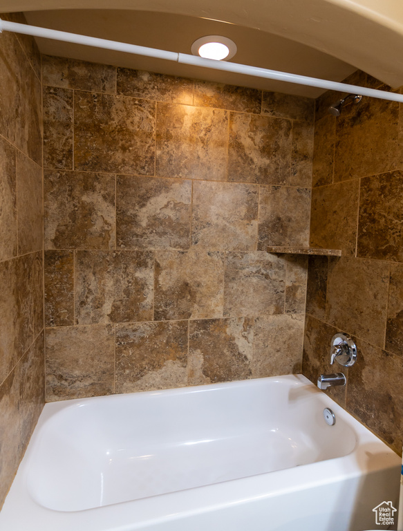 Full bathroom with shower / bath combination