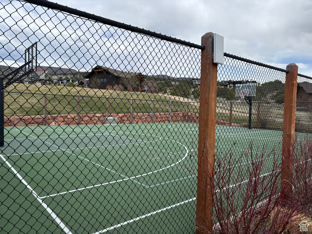 View of sport court with fence and community basketball court