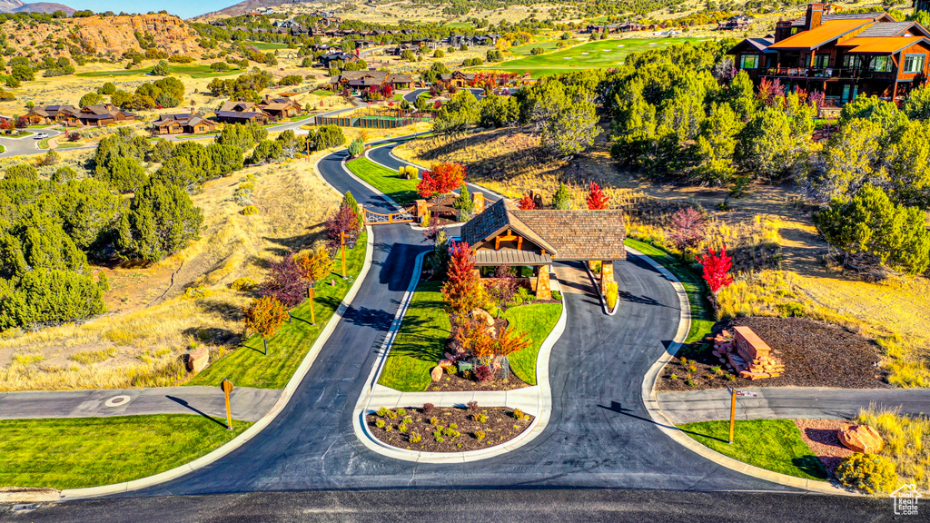 Drone / aerial view with a residential view and a mountain view